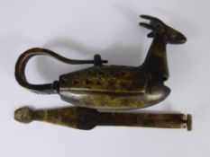 A Middle Eastern Brass Chest Lock in the form of a horned animal.