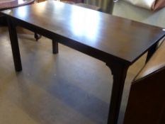 A Bespoke Stained Oak Dining Table having chamfered legs, approx. 153 x 76 x 72 cm