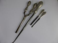 A Hammered Silver Manicure and Boot Hook Set, Birmingham hallmark (rubbed) together with a pair of