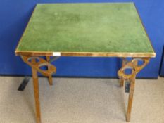 A Vintage Folding Gaming Table, the table covered in green baize with fold out drinks holders.