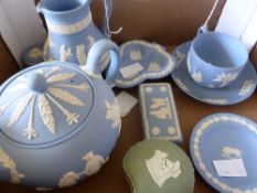 A Quantity of Wedgwood, including a teapot, milk jug, tea cup and saucer and trinket boxes