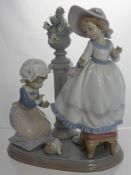 A Lladro Special Edition Piece depicting two girls playing, impressed marks to base 5344 A-SS H,