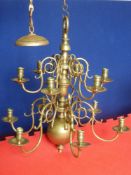 A Brass Chandelier in the 18th Century Dutch Style, twelve branch with ball and baluster stem with