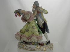 A Sitzendorf Porcelain Figure depicting a couple dancing, marks to base, approx 23 cms