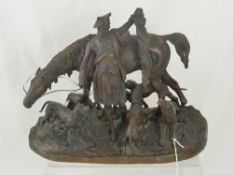 A Bronze Figure Group, depicting a Scottish Huntsman victorious in the hunt, with fox and hunting