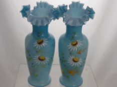 A Pair of Blue Victorian Opaline Vases, hand painted with daisies, approx 28 cms high.
