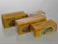 Four Reproduction Dinky Toys including Morris Mini Traveller, Bedford van, Bewick Roadmaster, a