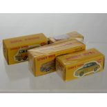 Four Reproduction Dinky Toys including Morris Mini Traveller, Bedford van, Bewick Roadmaster, a