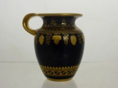 A Sevres 18th Century Small Gilded 'Empire Period' Jug, with gilt highlights, marks to base.