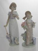 Two Lladro Figures depicting Girls Feeding Birds, impressed marks to base 7611 and 5217, 24 and 19