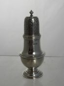 A Solid Silver Pepper, London hallmark, dated 1927/28, m.m John Pound & Co, approx 92 gms.