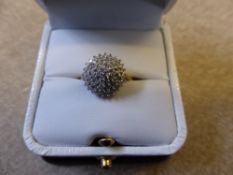 A Lady's 9 ct Gold and Diamond Beehive Ring, size N, wt 2.9 gms.