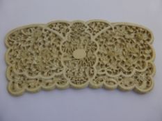 A 19th Century Ivory Panel, in the form of a butterfly, exquisitely delicate carving to central