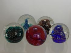 Five Caitness Glass Paperweights, including 'Fascination', 'Gold Rush' gold, green and blue and '