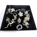 A Collection of Silver and Silver Metal Marquisite Vintage and Contemporary Marquisite brooches