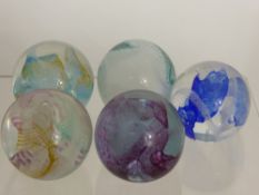 Five Caithness Glass Paper Weights, including 'Day Dream', 'Tempest' mauve, 'Tempest Blue', 'Force