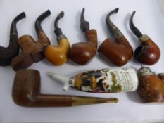 A Gentleman's Lot comprising twelve smoking pipes, including Peterson of Ireland, George Grose,