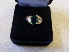 A Lady's 9 ct White Gold Green Tourmaline and Diamond Ring, size O, wt 3.5 gms.
