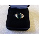 A Lady's 9 ct White Gold Green Tourmaline and Diamond Ring, size O, wt 3.5 gms.