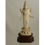 An Antique Indian Carved Figure of Laksmi, approx ht of figure 21 cms, the figure standing on an