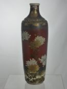 A Tall Japanese Satsuma Vase, depicting chrysanthemum and butterflies on a red ground, approx 40