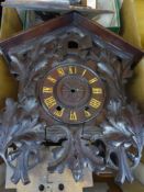 A Continental Black Forest Cuckoo Clock with original cuckoo, in need of complete restoration.