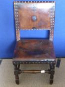 An Antique Cromwellian Hall Chair, leather upholstered back and seat, on turned and square