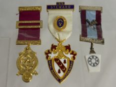 Miscellaneous Masonic Jewels including a ribbon suspended on metal clasps with a white square