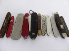 A Quantity of Ten Knives, two Swiss knives, two bone handled knives, a Thorn EMI stainless steel