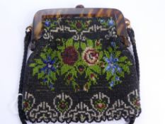 A vintage lady's beaded evening bag, with tortoiseshell clasp.