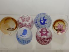 Six Caithness Glass Paper Weights, including 'Baby' in pink and two blue, 'Heart of Gold', 'Wee