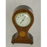 An Edwardian Mahogany Inlaid Mantel Clock, the clock having white enamel face on ball feet,