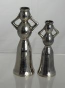 A Pair of Grecian Silver Vases. The vases take the form of feminine figures, the first approx 17 cms