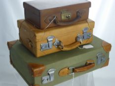 Three Small Vintage Canvas and Leather Suitcases.