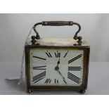 A Vintage French Art Deco Style Silver Plated Carriage Clock, with enamel face with elongated