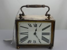 A Vintage French Art Deco Style Silver Plated Carriage Clock, with enamel face with elongated