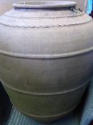 A Large Vintage Terracotta Portuguese Olive Oil Amphora 63 cms high 155 cms girth.