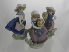 Three Lladro Pieces Depicting Young Girls, impressed marks to base 5221 D-15 J, 5222 D1D and D.8J