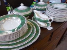 A Part Ducal Ware Dinner Service, including three oval meat plates, two lidded tureens, eight soup