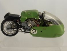 A Vintage Model Moto-Guzzi Motor Bike by Protar, made in Italy and signed.