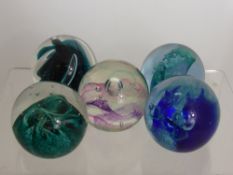 Five Caithness Glass Paper Weights, including ''Steel Blue', 'Wave Crest', 'Sea Foam', 'High Seas'