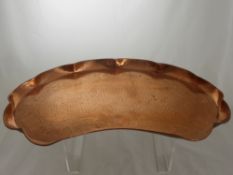 An Art Nouveau Newlyn Style Copper Tray, with hammered finish and decorative floral design.