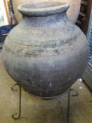 A Large Vintage Terracotta Portuguese Olive Oil Amphora 80 cms high 213 cms girth.