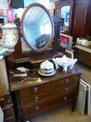 An Edwardian Inlaid Dressing Table, having three long drawers with oval mirror,  98 x 92 x 160 cms.