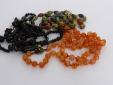Three Beaded Necklaces, including a Black Murano style necklace, a Cornelian effect stone necklace
