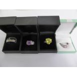 A Collection of Miscellaneous 925 Silver Rings, including amethyst, red and pink stone (4).