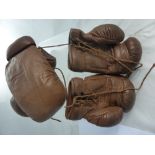 Two Pairs of Vintage Leather Boxing Gloves.