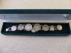 A Silver Vintage Coin Bracelet including USA, UK and Belgium together with an 1896 solid silver