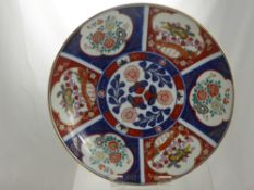 A Japanese Imari Charger, Enchantment by Banfatan, decorated with peony and phoenix together with