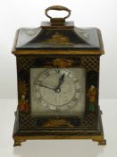 A Circa 1900 Chinoserie Cased Carriage Clock, the clock having a sarcophagus shaped top depicting